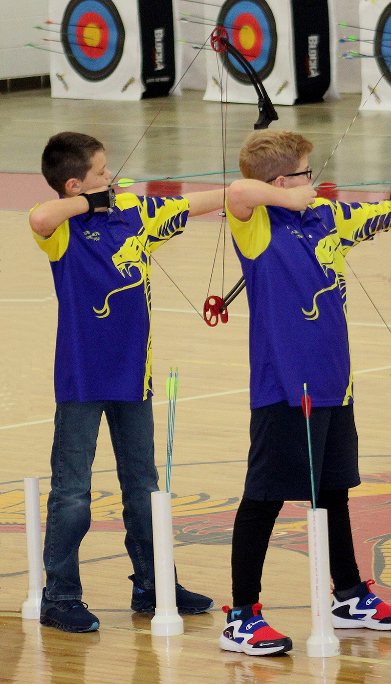 archery students drawing bows